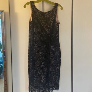 Black lace sheath dress with gather at waist